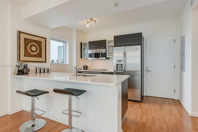 Gorgeous 2/2 corner unit with wrap around balcony. Floor to