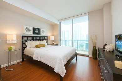 Gorgeous 2/2 corner unit with wrap around balcony. Floor to