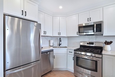 Triple-Mint High-Floor Corner Condo with Balcony, Water Views & - photo 8