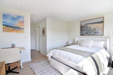 Triple-Mint High-Floor Corner Condo with Balcony, Water Views & - photo 9