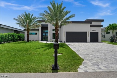 Experience luxury waterfront living in this stunning - photo 1