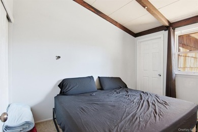 Nestled in Three Village School District, this four bedroom - photo 15