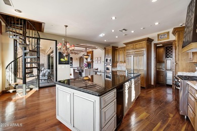 Set within the gated waterfront community of Lake Serena Estates