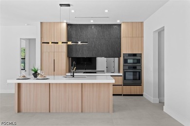 Experience luxury waterfront living in this stunning - photo 8