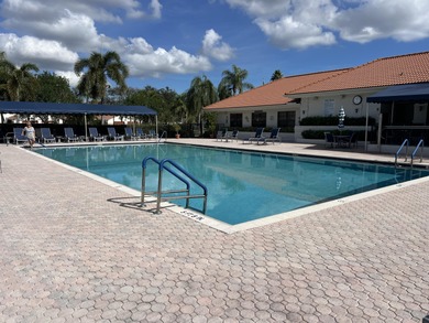Charming 55+ community with a great location! Off of Boynton