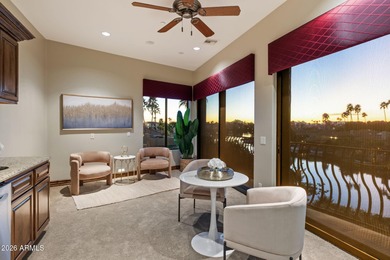 Set within the gated waterfront community of Lake Serena Estates