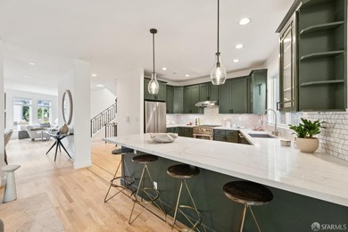 This gorgeous, light-filled home with wood floors throughout - photo 29