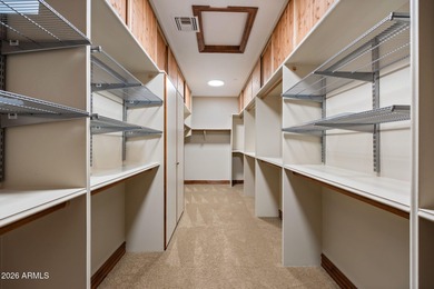 Set within the gated waterfront community of Lake Serena Estates