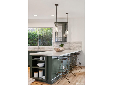 This gorgeous, light-filled home with wood floors throughout - photo 31