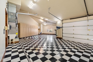 Set within the gated waterfront community of Lake Serena Estates