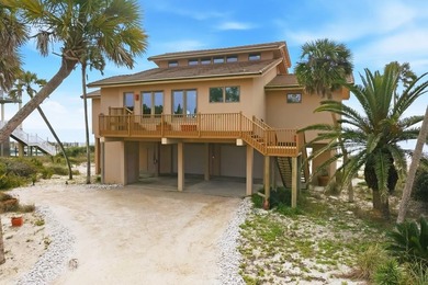 Located within a highly desirable gated coastal community, this