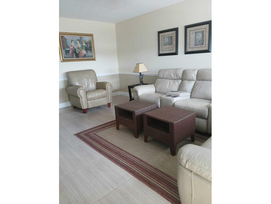 Welcome to this well-appointed 2-bedroom, 1.5-bathroom - photo 1