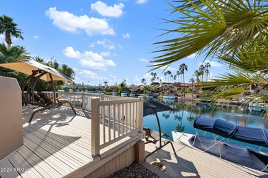 Set within the gated waterfront community of Lake Serena Estates