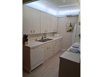 Welcome to this well-appointed 2-bedroom, 1.5-bathroom - photo 3