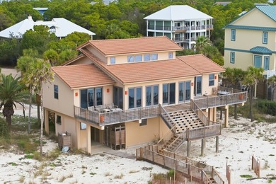 Located within a highly desirable gated coastal community, this