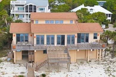 Located within a highly desirable gated coastal community, this