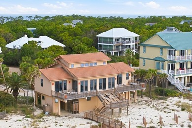 Located within a highly desirable gated coastal community, this