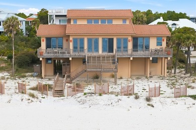 Located within a highly desirable gated coastal community, this