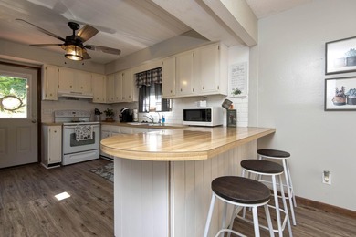 This well-maintained 4-bed, 2-bath home is truly move-in ready - photo 9