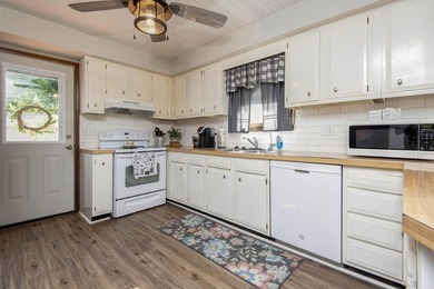 This well-maintained 4-bed, 2-bath home is truly move-in ready - photo 10