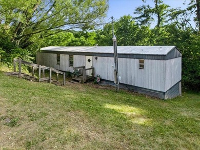 This home is an affordable option as either a personal residence - photo 1