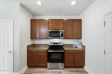 Welcome to this beautifully maintained **corner-unit townhome** - photo 14