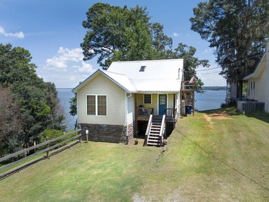 This exceptional lakefront property offers panoramic main lake - photo 2