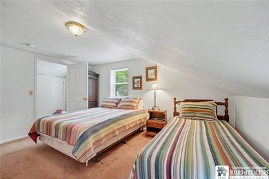 Nestled along the tranquil shores of Chautauqua Lake, this - photo 31