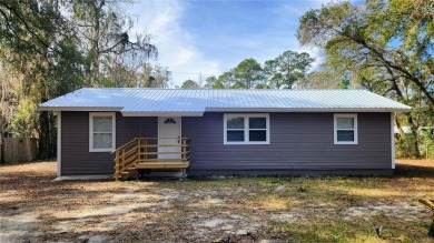 Lake Home For Sale in Gainesville, Florida