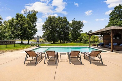 Breathtaking lake views take center stage in this exceptional - photo 2
