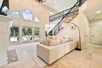 Breathtaking lake views take center stage in this exceptional - photo 5