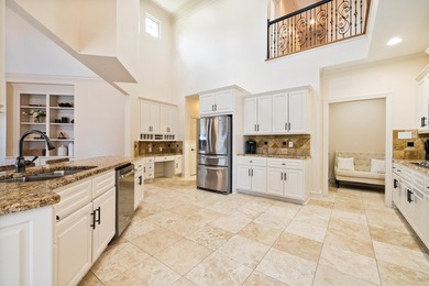 Breathtaking lake views take center stage in this exceptional - photo 8