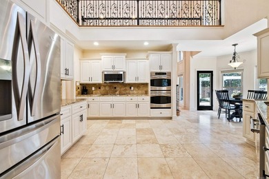 Breathtaking lake views take center stage in this exceptional - photo 10