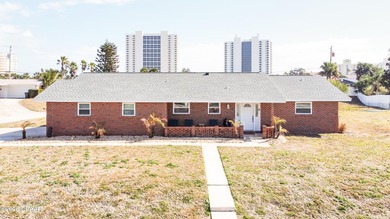 Beachside Living at Its Best! This move-in ready 3-bedroom - photo 1
