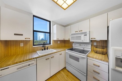 Brand-new floor-to-ceiling impact windows enhance this bright - photo 13
