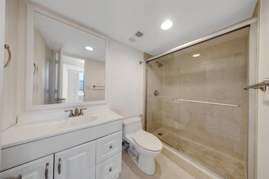 Brand-new floor-to-ceiling impact windows enhance this bright - photo 19