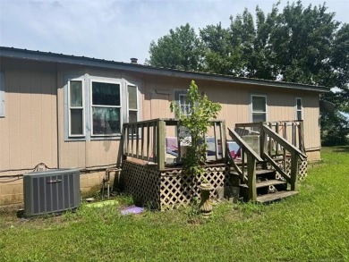 Spacious Double-Wide on Small Acreage - Investment Opportunity!
