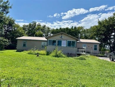 Spacious Double-Wide on Small Acreage - Investment Opportunity!
