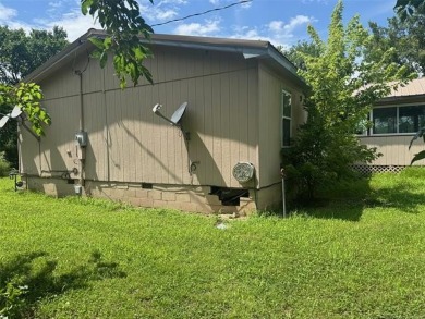 Spacious Double-Wide on Small Acreage - Investment Opportunity!
