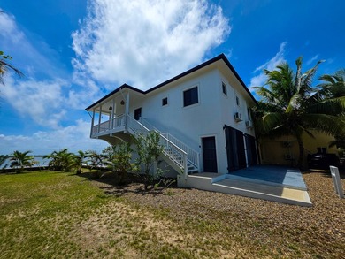 Perched along the tranquil shores of the Placencia Lagoon - photo 4