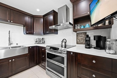 Stunning completely renovated spacious 3/2.5 *F* Model unit in - photo 3