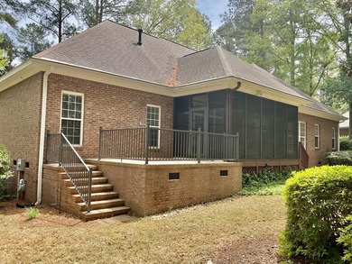 The expressive brick entrance staircase invites you into a well - photo 23
