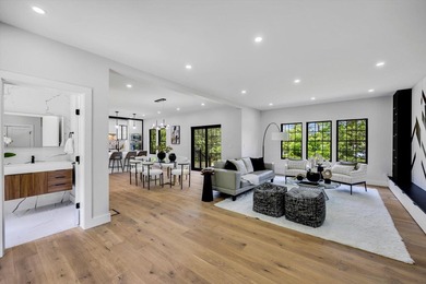 Stunning New Waterfront Construction with Sweeping Water Views - photo 11