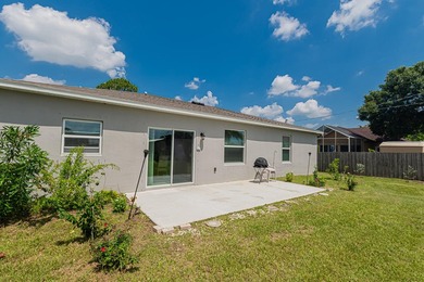 Built in 2023, this 3/2/2 CBS home perfectly combines modern - photo 13