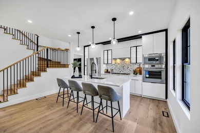 Stunning New Waterfront Construction with Sweeping Water Views - photo 16