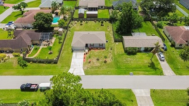 Built in 2023, this 3/2/2 CBS home perfectly combines modern - photo 17