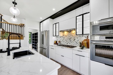 Stunning New Waterfront Construction with Sweeping Water Views - photo 18