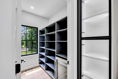 Stunning New Waterfront Construction with Sweeping Water Views - photo 19