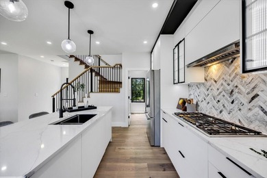 Stunning New Waterfront Construction with Sweeping Water Views - photo 20