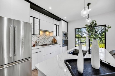 Stunning New Waterfront Construction with Sweeping Water Views - photo 22